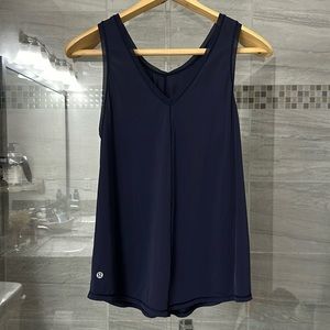 Lululemon top, I do not see the size but I am small-medium, excellent condition.
